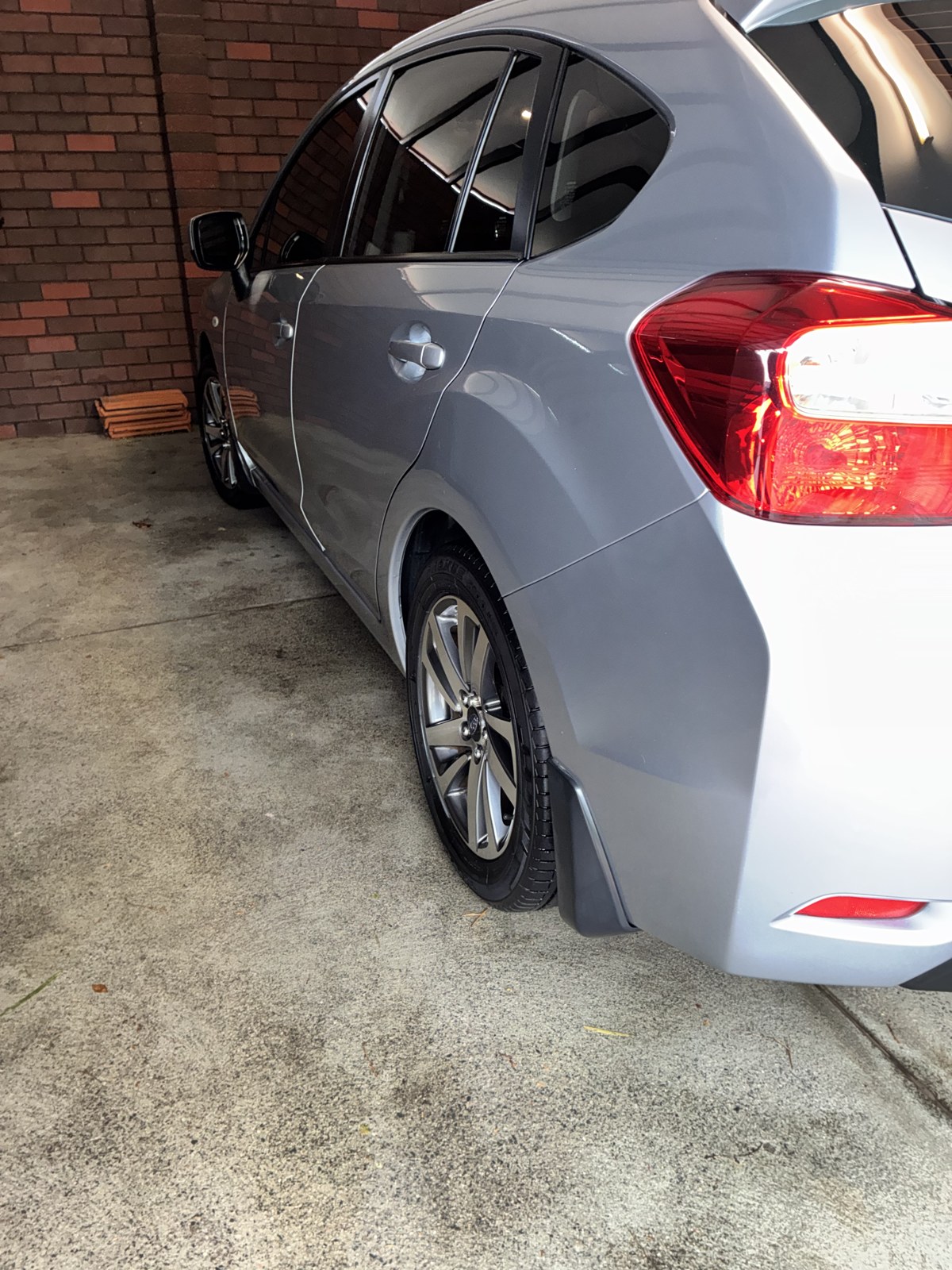 Silver Subaru hatchback gleaming after a full Squeaks exterior detail